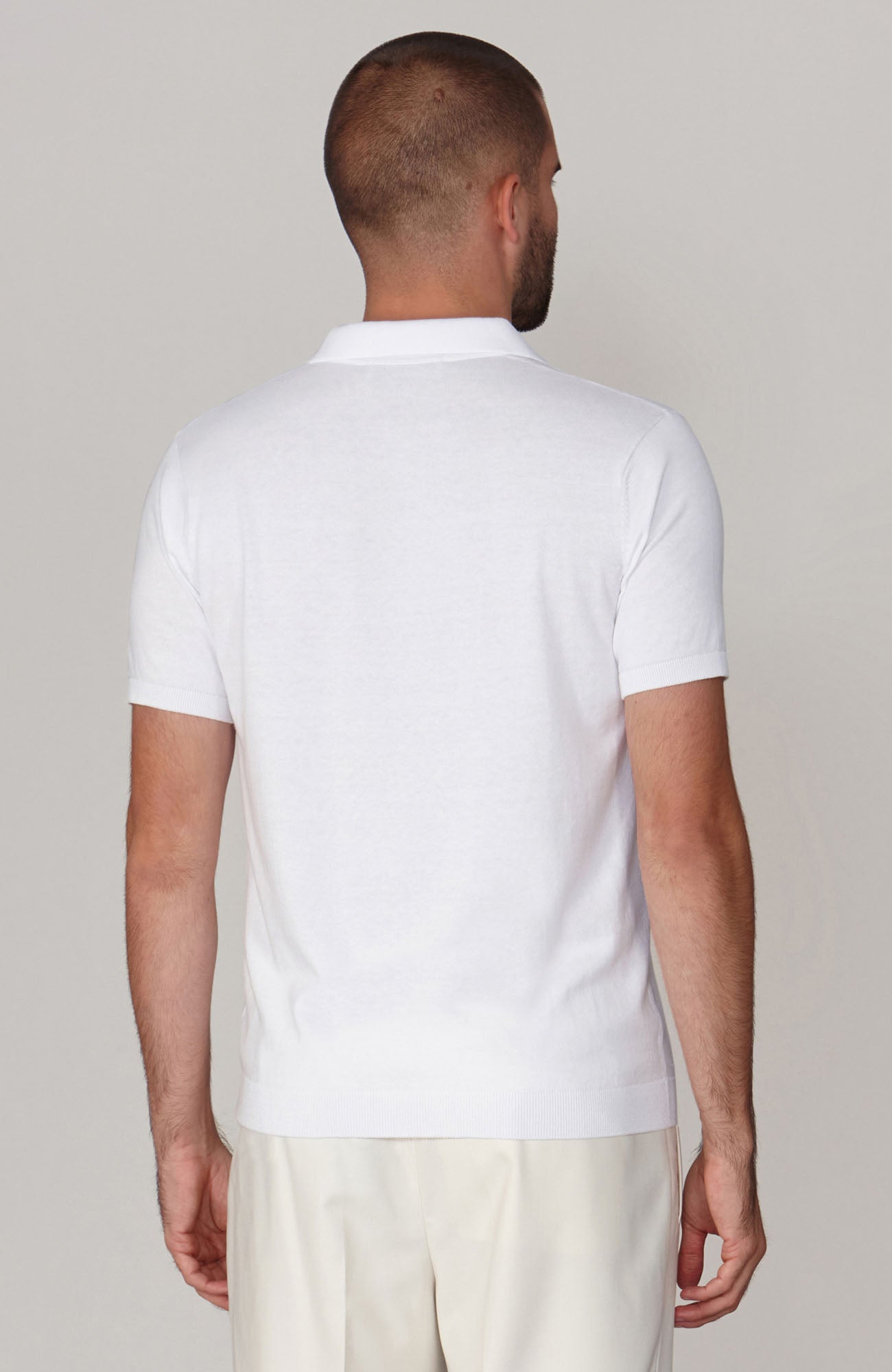 white mens short sleeve polio shirt