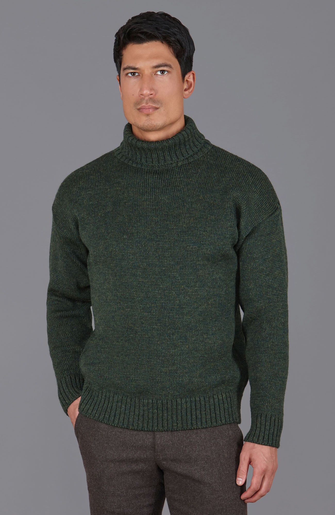 green roll neck wool jumper