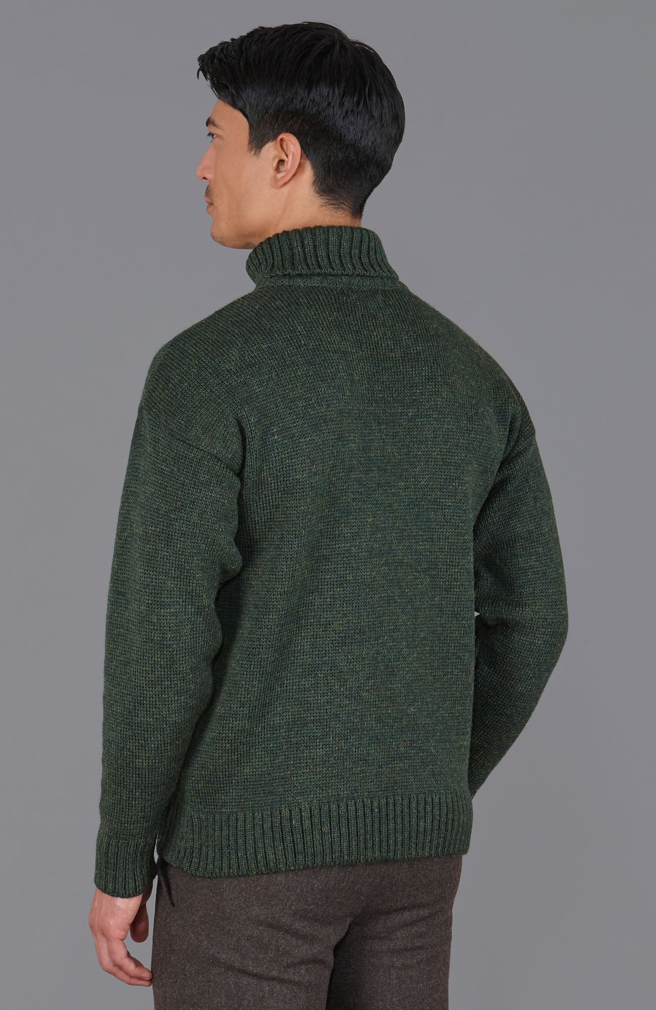 green roll neck wool jumper